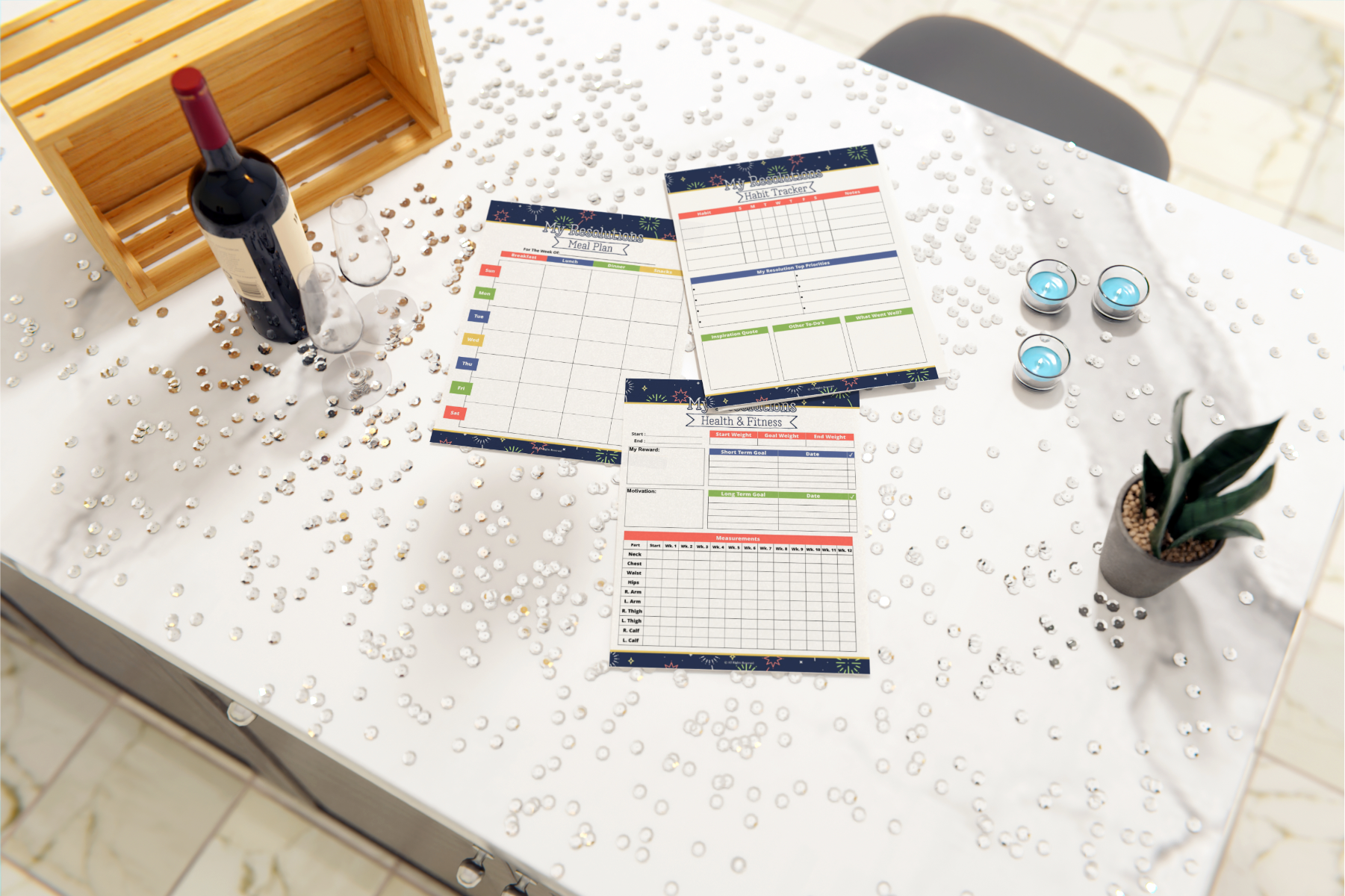 A marble table adorned with a bottle of wine, two glasses, tealight candles, a small plant, and three Resolution Planner pages by Wondermom Shop. Scattered decorative beads set the stage for moments of personal growth.