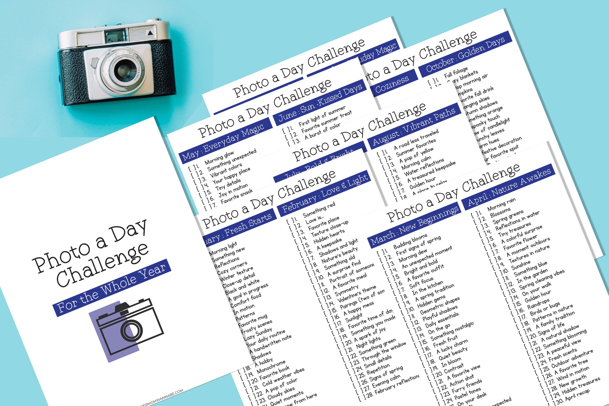 A photo features a camera and pages highlighting "Photo-a-Day Challenge: A Year of Creativity" by Wondermom Shop, with monthly prompts such as "Everyday Magic" and "New Beginnings," designed to boost photography skills through daily creative themes.