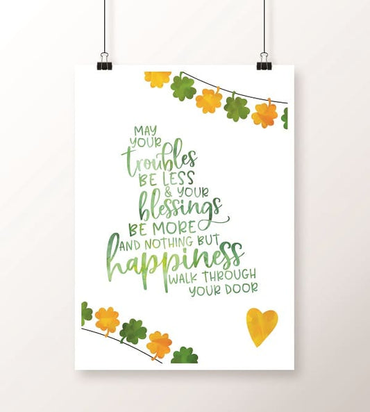 The VIP Vault's Printable May Your Troubles Be Less Sign hangs by clips and showcases decorative autumn leaves, along with the heartwarming message: "May your troubles be less and your blessings be more and nothing but happiness walk through your door." Ideal as a digital product for seasonal decor or adding some St. Patrick's Day cheer!
