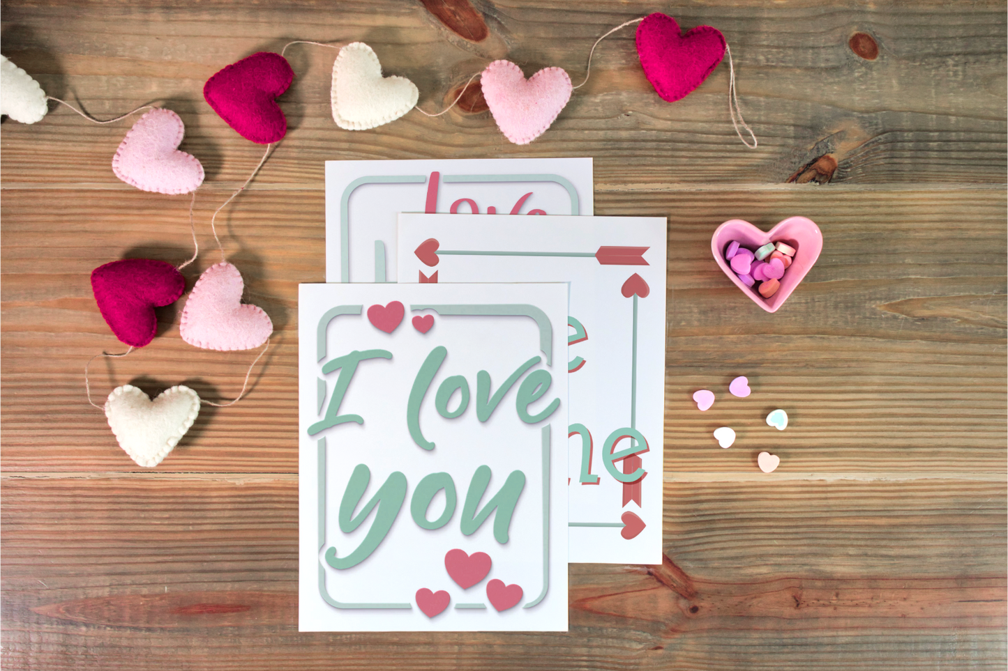 Valentine's day cards displayed on a Be My Valentine Planner branded by Wondermom Shop.