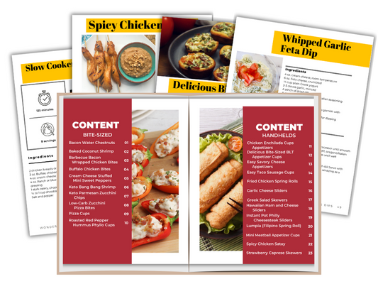 The Appetizers & Dips Cookbook by Wondermom Shop showcases recipes like stuffed peppers, sandwiches, and chicken with titles such as "Spicy Chicken," "Slow Cooker," and "Whipped Garlic Feta Dip," ideal for creating handheld favorites and bite-sized appetizers.