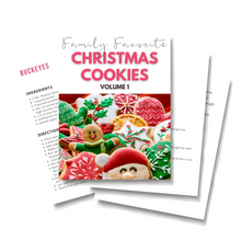 Load image into Gallery viewer, Get into the holiday spirit with Wondermom Wannabe&#39;s digital cookbook, &quot;Family&#39;s Favorite Christmas Cookies Volume 1.&quot; Indulge in a collection of mouthwatering recipes that will become your key to creating the.
