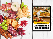 Load image into Gallery viewer, A charcuterie board with meats, cheeses, fruits, nuts, and crackers pairs perfectly with a tablet showing Wondermom Shop&#39;s &quot;Appetizers &amp; Dips Cookbook: Crowd-Pleasing Recipes for Every Occasion,&quot; ideal for creating bite-sized appetizers.
