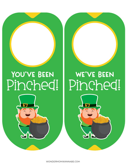 Add a playful touch to your St. Patrick's Day with VIP Vault's "You’ve Been Pinched" printable set. These green door hangers feature a leprechaun with a pot of gold and the text "You've Been Pinched!", perfect for the "We've Been Pinched!" game.