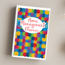 Load image into Gallery viewer, Colorful planner with Wondermom Shop&#39;s &quot;Home Management Planner Bundle (Printable &amp; Digital Versions)&quot; text, featuring a multicolored dot pattern cover with a bill payment tracker section, placed on a light surface.
