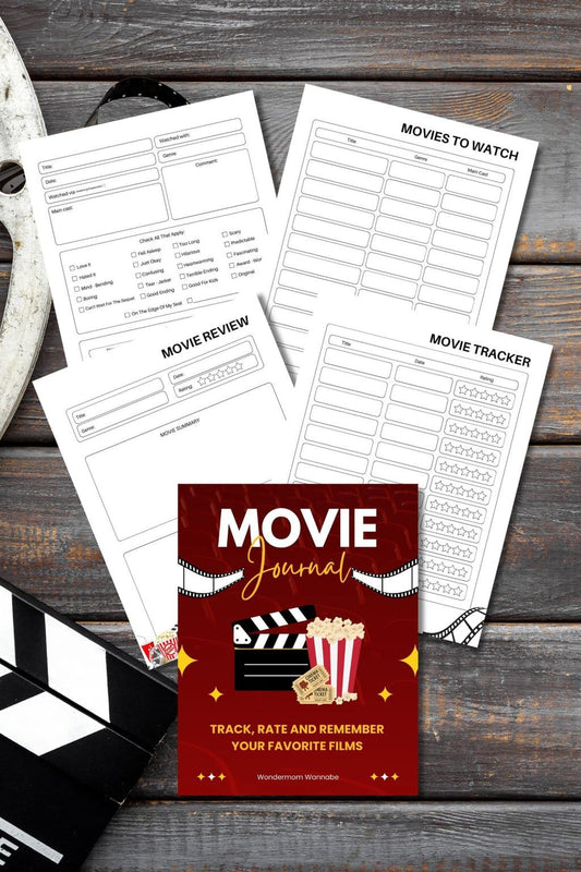 The VIP Vault Movie Journal rests on a wooden surface, inviting film enthusiasts to jot down reviews, list must-watch movies, and track their cinematic journey. Nearby, a film reel and clapperboard create the perfect setting for memorable nights with the Family Movie Journal.