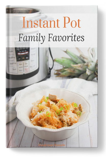A Wondermom Wannabe Instant Pot Family Favorites Digital Cookbook with a bowl of rice and pineapple.