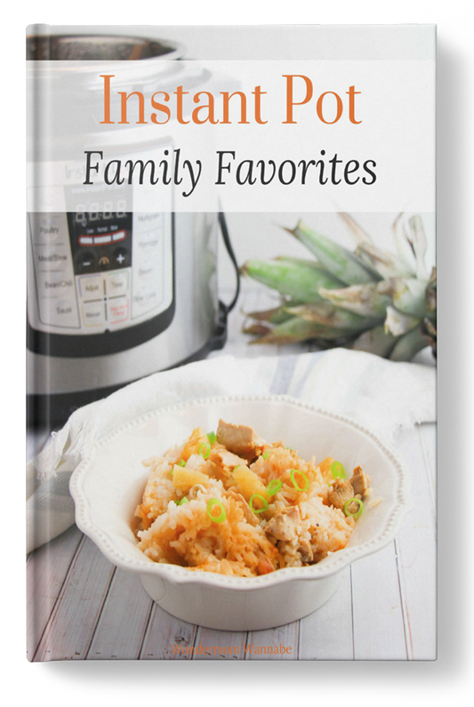 A Wondermom Wannabe Instant Pot Family Favorites Digital Cookbook with a bowl of rice and pineapple.