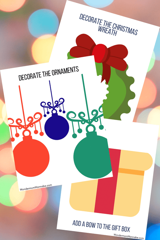 A set of VIP Vault Christmas Playdough Mats on a background of bokeh lights. Perfect for creative play!