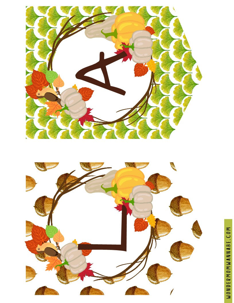 Two hexagonal autumn-themed frames from the Wondermom Shop Fall Festival Party Kit, decorated with pumpkins, leaves, and acorns. One frame features a letter "A" inside, while the other is empty. These printable elements have a repeated pattern of ginkgo leaves and acorns, making them perfect for your digital product or Fall Festival Party Kit.