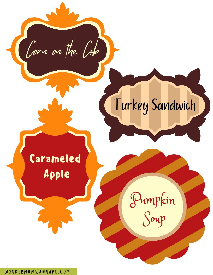 Wondermom Shop's Fall Festival Party Kit includes four beautifully designed food labels with decorative borders featuring "Corn on the Cob," "Turkey Sandwich," "Carameled Apple," and "Pumpkin Soup." These printable elements add a charming touch to your digital product lineup.