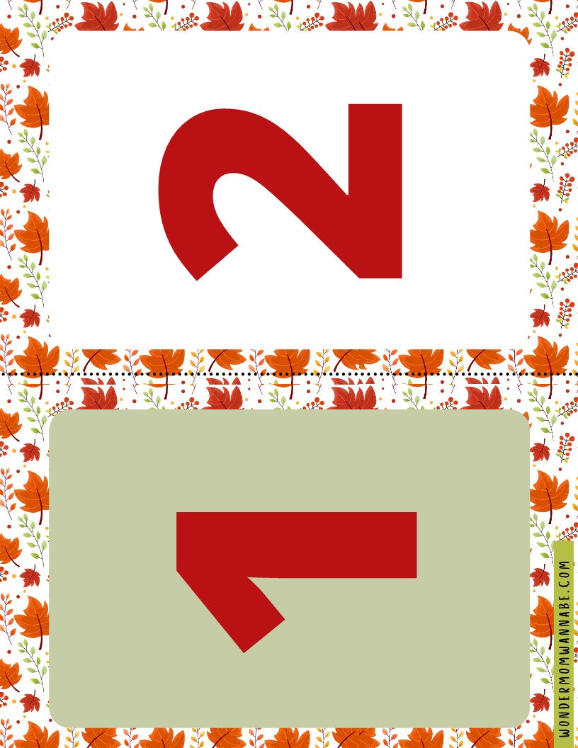 Two red arrows pointing in opposite directions are placed in separate boxes with a decorative autumn leaf border, along with a website URL at the bottom. Perfect for your seasonal celebrations, this digital product from Wondermom Shop includes printable elements to enhance your Fall Festival Party Kit.