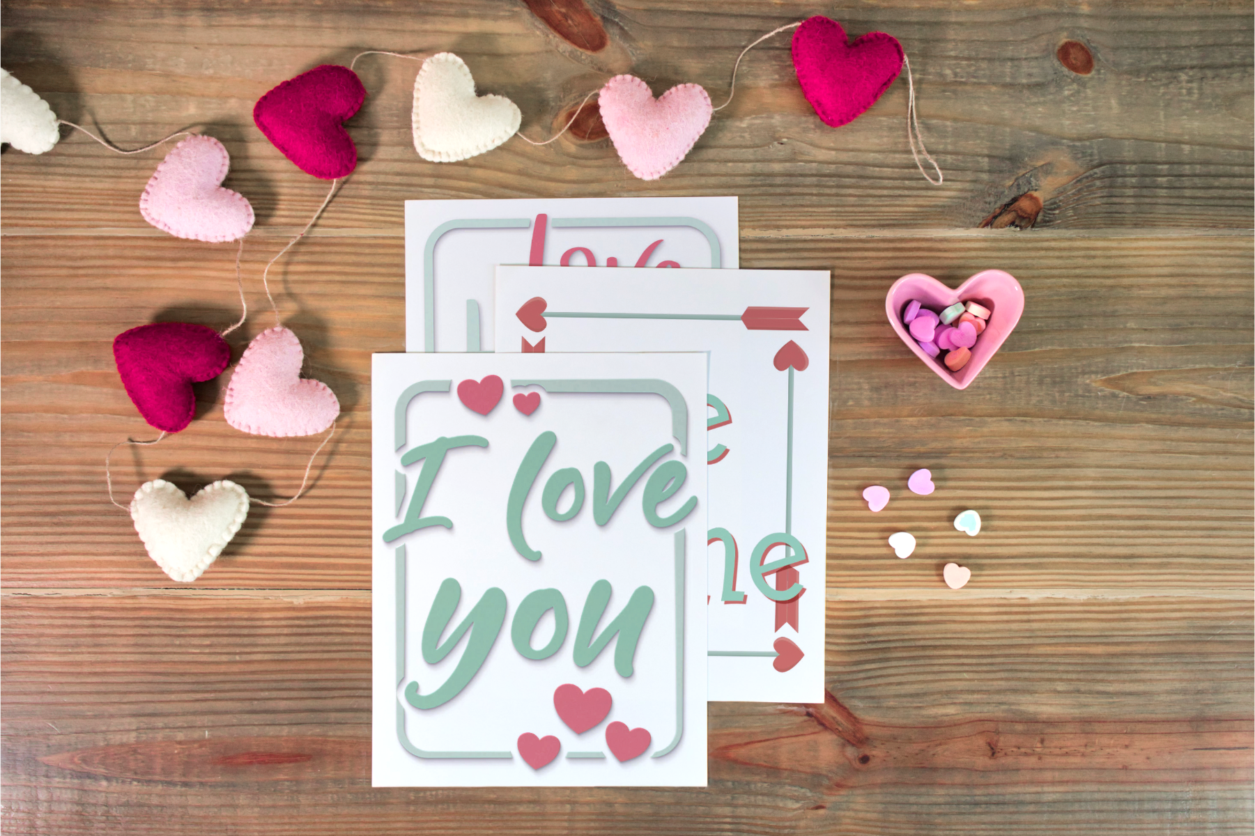 Valentine's day cards displayed on a Be My Valentine Planner branded by Wondermom Shop.