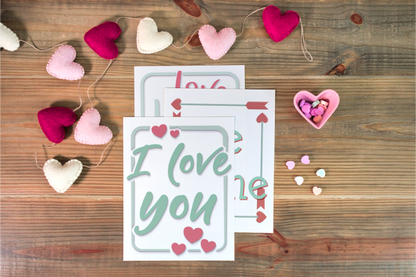 Valentine's day cards displayed on a Be My Valentine Planner branded by Wondermom Shop.