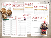Load image into Gallery viewer, A VIP Vault Christmas Planner with ornaments and pinecones.
